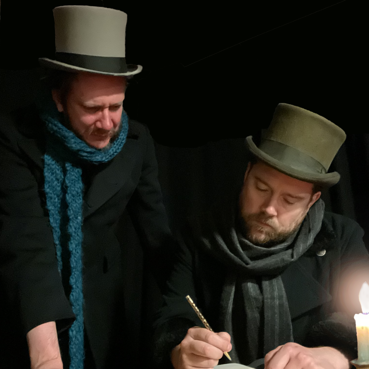CC 1 V2 Abingdon Drama Club's Christmas Carol Ebenezer Scrooge with his humble clerk, Bob Cratchit
